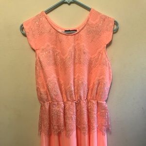 Bright coral lace dress.